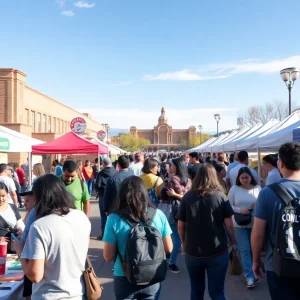 Volunteers at Albuquerque Volunteer Fest booth interaction